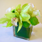 Flowers used: chartreuse cymbidium orchids, white calla lilies, green mini mums