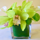 Flowers used: chartreuse cymbidium orchids, white calla lilies, green mini mums