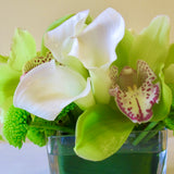 Flowers used: chartreuse cymbidium orchids, white calla lilies, green mini mums