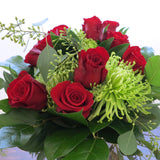 Flowers used: red roses, green chrysanthemums