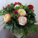 Flowers used: red blush roses, red hot anemones