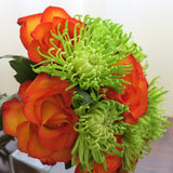 Flowers used: orange roses, green mums