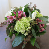 Flowers used: white roses, pink alstroemerias, green hydrangeas, seeded eucalyptus
