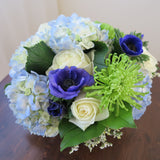 Flowers used: cream white roses, blue anemones, blue hydrangeas, green chrysanthemums