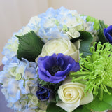 Flowers used: cream white roses, blue anemones, blue hydrangeas, green chrysanthemums
