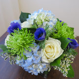 Flowers used: cream white roses, blue anemones, blue hydrangeas, green chrysanthemums