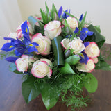 Flowers used: red blush roses, mauve tulips, blue irises