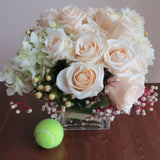 Flowers used: cream roses, white orchids and dahlias adored by white hypericum and dogwoods berries