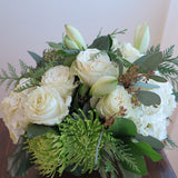 Flowers used: cream roses, white amaryllis, white hydrangeas, green chrysanthemums and seeded eucalyptus