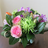 Flowers used: pink blush roses, green chrysanthemums, mauve hyacinths and orchids, red tulips, seeded eucalyptus