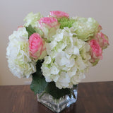 Flowers used: pink blush and white roses, green chrysanthemums, white hydrangeas