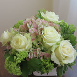 Flowers used: green roses, rusty green hydrangeas, green viburnums