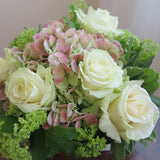 Flowers used: green roses, rusty green hydrangeas, green viburnums