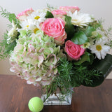 Flowers used: pink roses, rusty green hydrangeas, white daisies and white gerberas