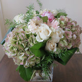 Flowers used: pink peonies, rusty green hydrangeas, cream roses, white and pink gerberas
