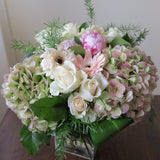 Flowers used: pink peonies, rusty green hydrangeas, cream roses, white and pink gerberas