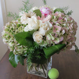 Flowers used: pink peonies, rusty green hydrangeas, cream roses, white and pink gerberas