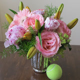 Flowers used: orange lilies, salmon pink roses and gerberas, pink peonies