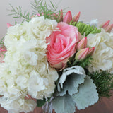 Flowers used: pink tulips and roses, green chrysanthemums, white hydrangeas