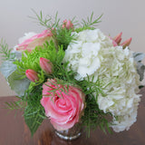 Flowers used: pink tulips and roses, green chrysanthemums, white hydrangeas