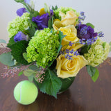 Flowers used: yellow roses, purple lisianthus, green hydrangeas, seeded eucalyptus