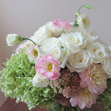 Flowers used: green hydrangeas, cream roses, white and blush pink dahlias, white and pink lisianthus, pink sedums