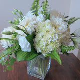Flowers used: white hydrangeas, white dahlias, white lisianthus