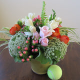 Flowers used: pink roses, orange ranunculus, white freesias, white Anne's Lace, pink hypericum berries