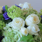Flowers used: cream white roses, blue anemones, green hydrangeas, green viburnum, white lisianthus