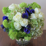 Flowers used: cream white roses, blue anemones, green hydrangeas, green viburnum, white lisianthus