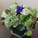 Flowers used: cream white roses, blue anemones, green hydrangeas, green viburnum, white lisianthus