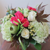 Flowers used: pink and white roses, white lisianthus, green poppy seedpods, white hypericum berries, green hydrangeas