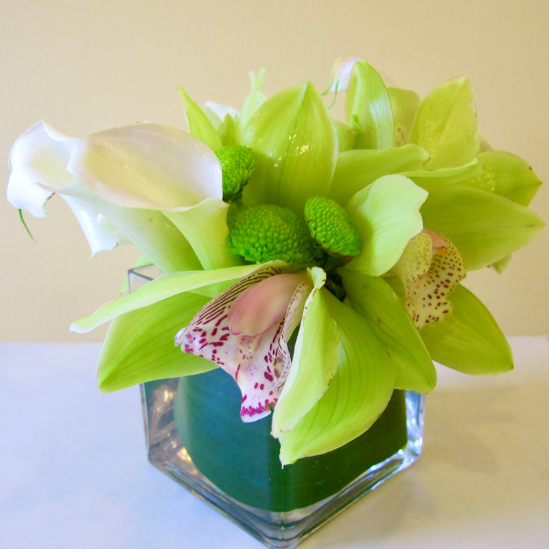 Flowers used: chartreuse cymbidium orchids, white calla lilies, green mini mums