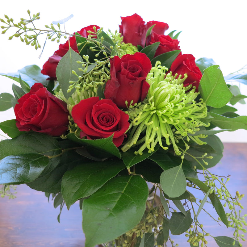 Flowers used: red roses, green chrysanthemums