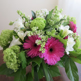 Flowers used: white freesias, lavender pink gerberas, white lilacs, green viburnums