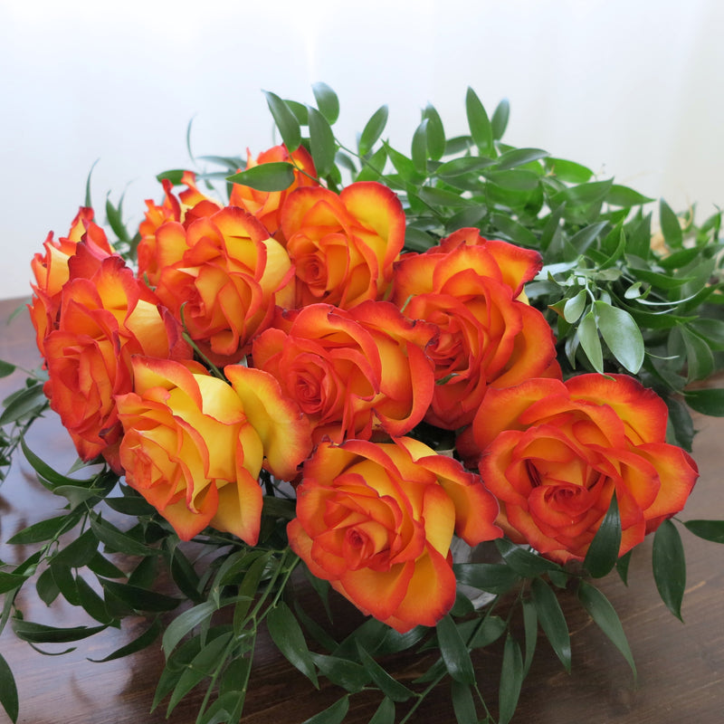 Flowers used: orange roses