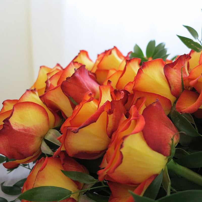 Flowers used: orange roses.