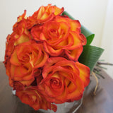 Flowers used: orange roses