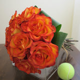 Flowers used: orange roses