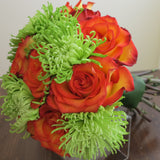 Flowers used: orange roses, green mums