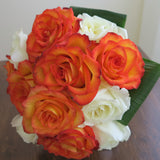 Flowers used: cream and orange roses