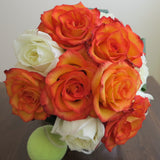 Flowers used: cream and orange roses