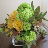 Flowers used: soft yellow roses, green viburnum