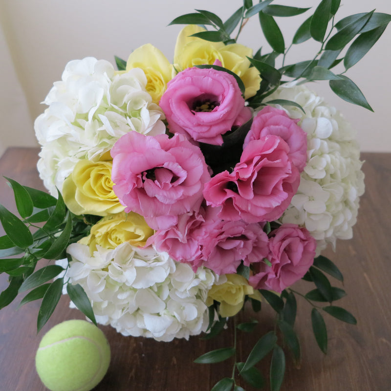 Flower used: soft yellow roses, pink lisianthus and white hydrangeas