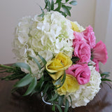 Flower used: soft yellow roses, pink lisianthus and white hydrangeas