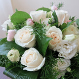 Flowers used: cream white roses, white lisianthus, pink ranunculus