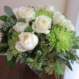 Flowers used: white roses, green chrysanthemum, green hydrangeas, seeded eucalyptus 