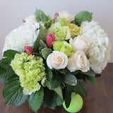 Flowers used: cream roses, white and green hydrangeas, pink tulips, chartreuse lisianthus
