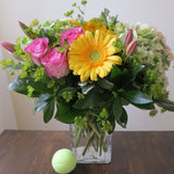 Flowers used: pink roses, yellow gerberas, pink tulips, rustic green hydrangeas, chartreuse lady's mantle