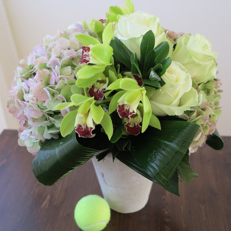 Flowers used: green roses, rusty green hydrangeas, chartreuse cymbidium orchids
